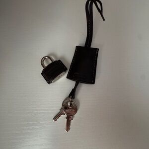 Coach lock and key in maple color